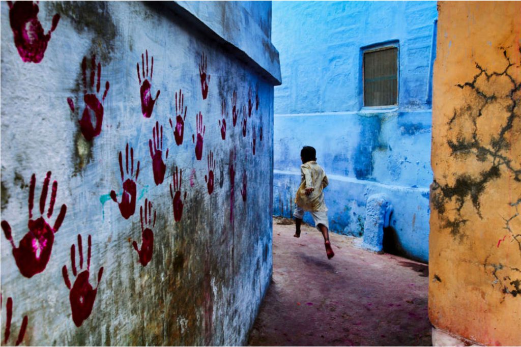 McCurry-Boy in mid flight
